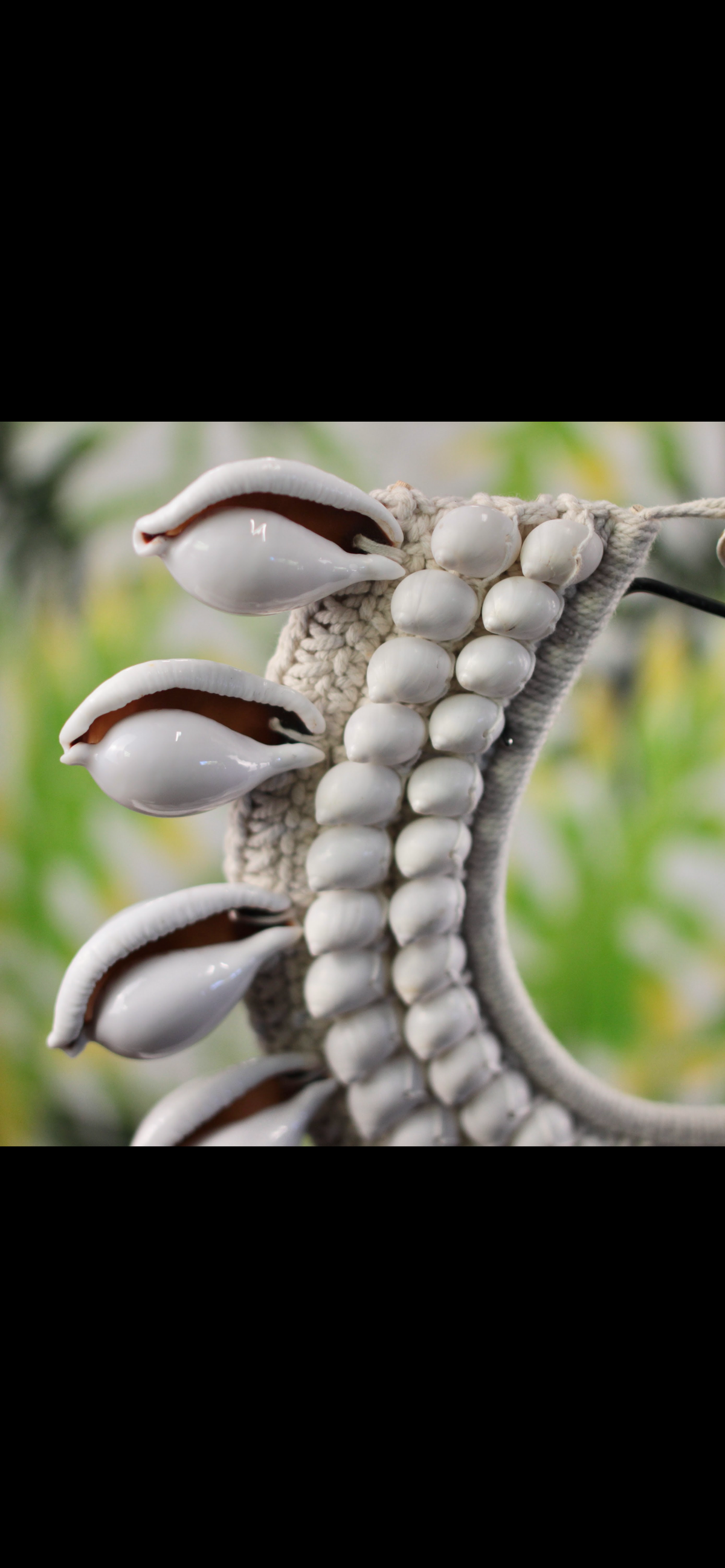 Handcrafted Shell Necklace on Stand · Tribal Décor