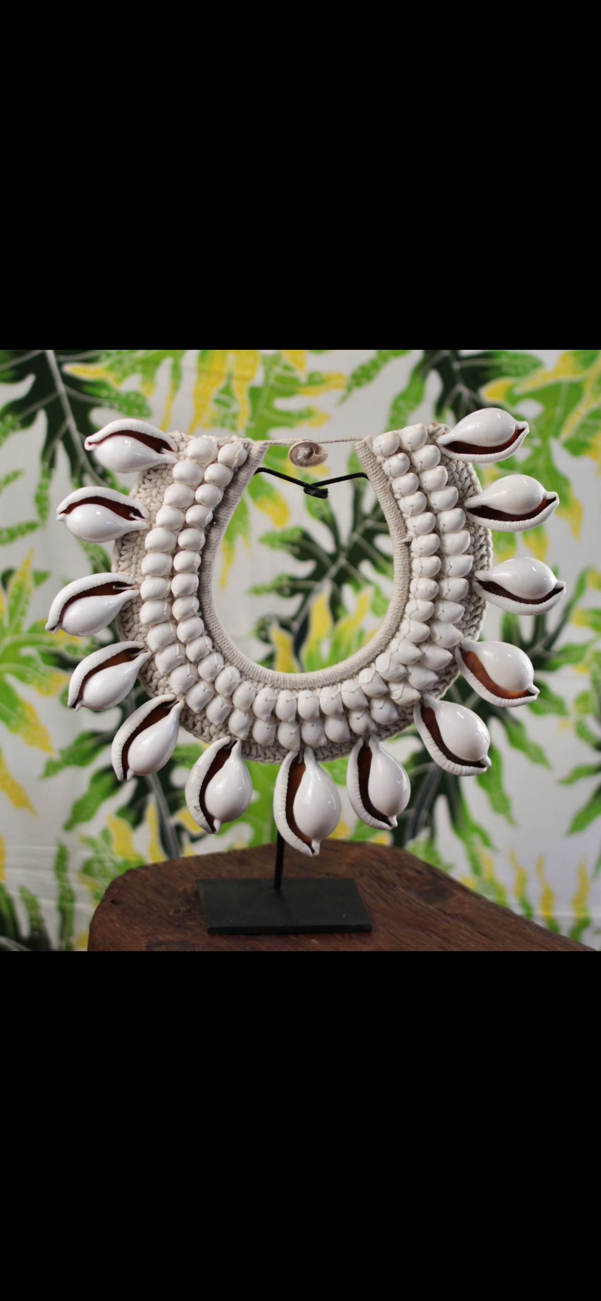 Handcrafted Shell Necklace on Stand · Tribal Décor