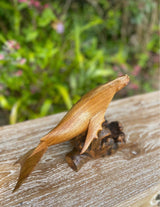 Hand-Carved Humpback Whale on Driftwood Base · Monkeypod Wood